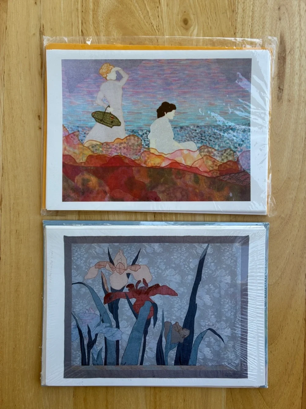 2 sealed sets of art cards. 11 cards and envelopes